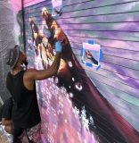 Local artist Mojo commissioned for murals that adorn new 545wyn building in Wynwood