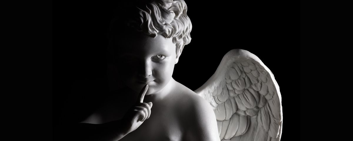 Cupid image, white on black background