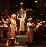 Review: Area Stage debuts a leaner, imaginatively immersive ‘Annie’