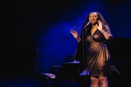 Like Ella Fitzgerald and Sarah Vaughan, who were “foundational” to her development as a singer, Samara Joy exudes elegance and sophistication. And like another of her favorites, Carmen McCrae, Joy really knows how to tell a story through song. (Photo by Csibi Szilvia Mupa, courtesy artist management)
