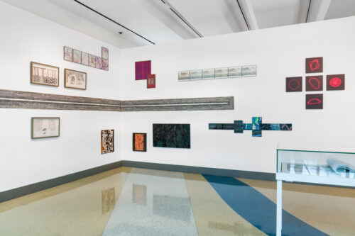 Installation view of “What’s My Line? Drawing as Experience,” presented by Edge Zones and curated by Dimitry Saïd Chamy and Charo Oquet at the Miami Beach Regional Library. The exhibition brings together 16 artists exploring drawing as process, memory, and spatial experience. (Photo by Mateo SeZa @mateo.seza, courtesy of Edge Zones)